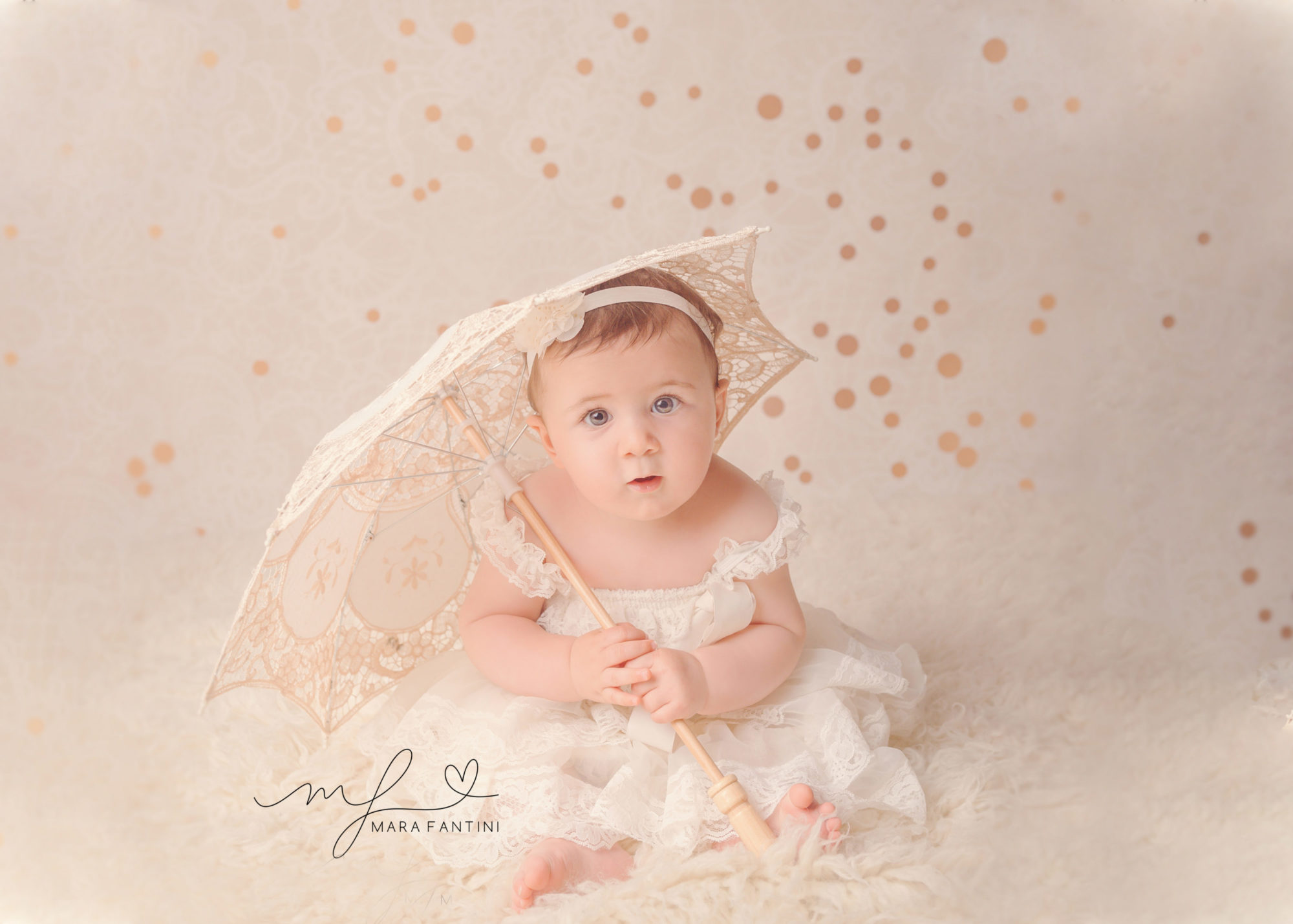 Servizio fotografico bambini Roma dai 3 mesi — ritratti famiglia in studio